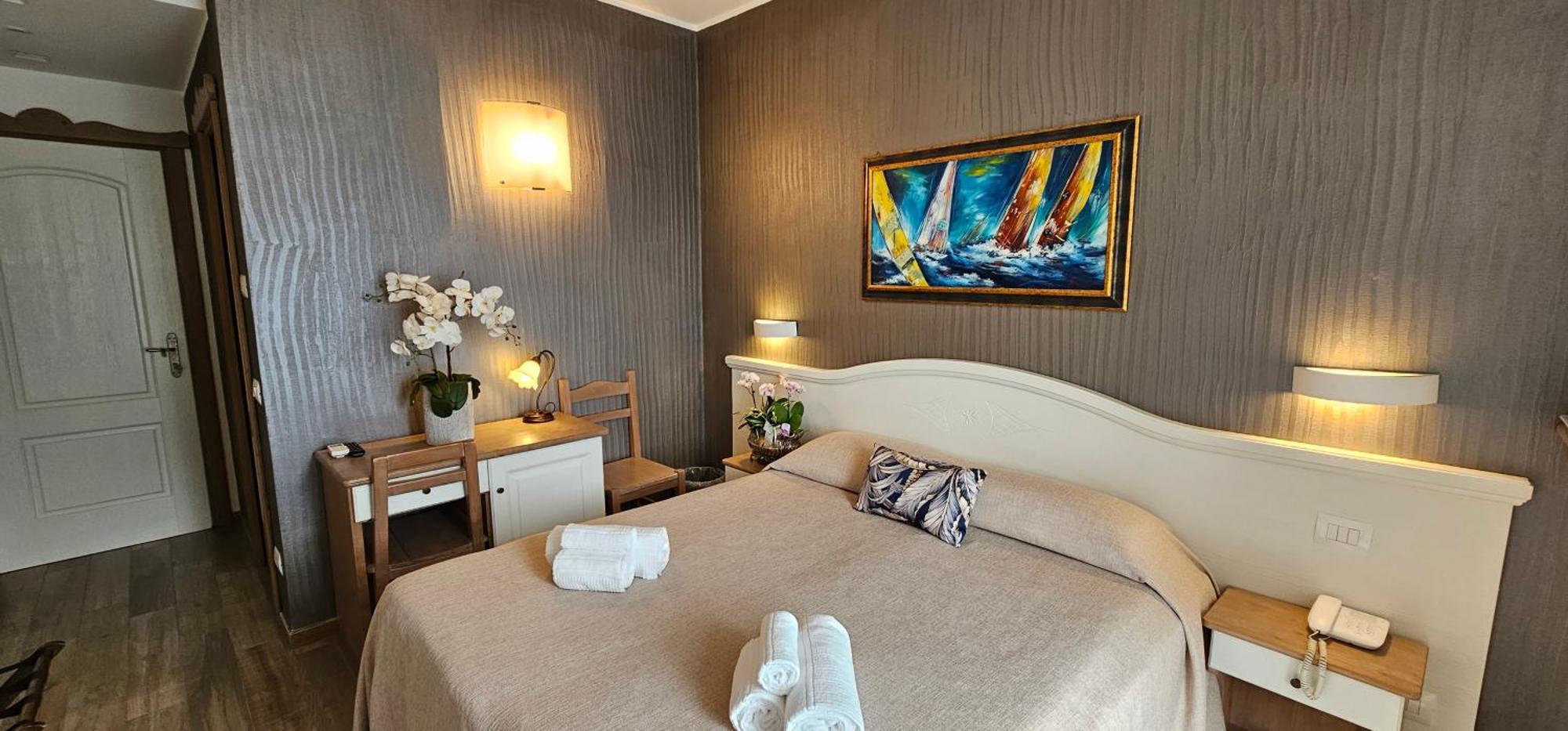 Hotel Meridiana Беллано Номер фото